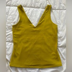 Express Yellow Body Contour Tank Top. Medium.
